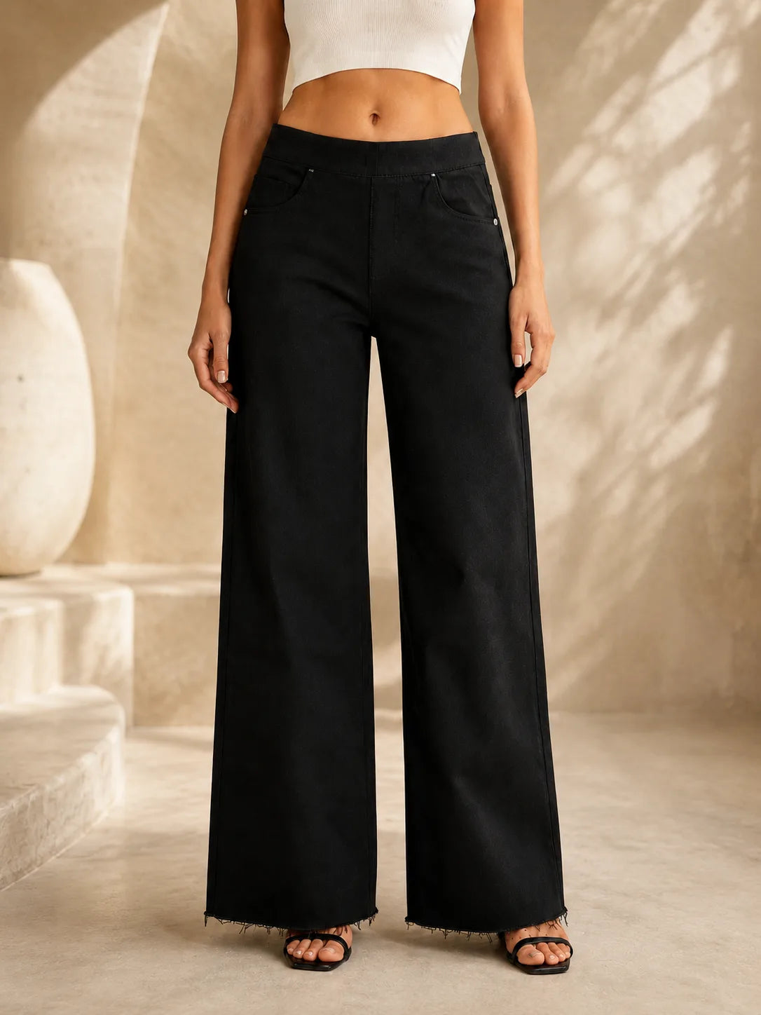 Black raw hem wide leg jeans for girls front view
