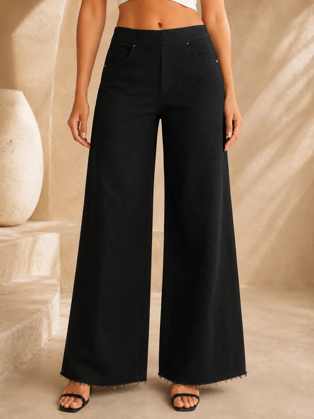 Black raw hem wide leg jeans for girls back view